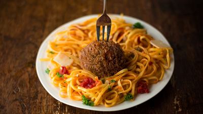 A bowl of pasta with cultivated meat