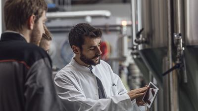 Brewer using tablet device in brew house